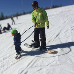Picture of Parent & Tot • 1hr Snowboard Lesson • Parent